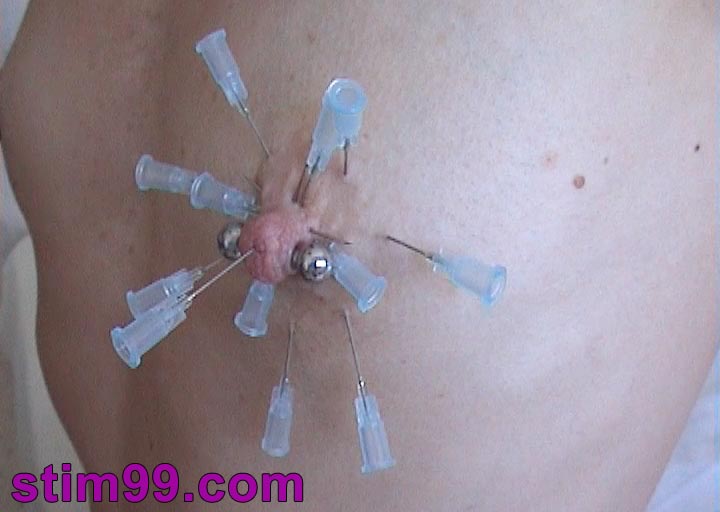 Sado masochist girl stick needles in her breasts and nipples