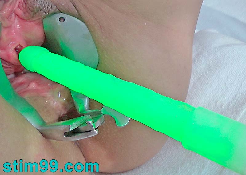 Peehole fucking with a luminous realistic dildo