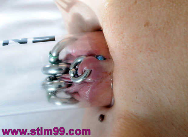 Pumping pussy with piercings